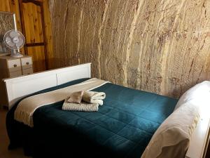 Postel nebo postele na pokoji v ubytování Down to Erth B&B