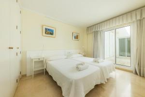 Ένα ή περισσότερα κρεβάτια σε δωμάτιο στο Olympo