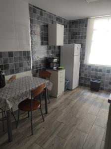 Η κουζίνα ή μικρή κουζίνα στο dormitorio bego
