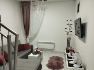TV in/ali zabaviščno središče v nastanitvi Apartman Katy