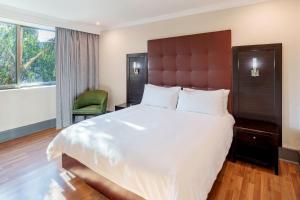 Postel nebo postele na pokoji v ubytování Protea Hotel by Marriott Lusaka