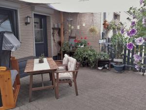 Κήπος έξω από το XXS Appartement - Studio für 2 Gäste mit Terrasse und Strandkorb