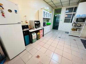 A cozinha ou kitchenette de 郵系空間民宿