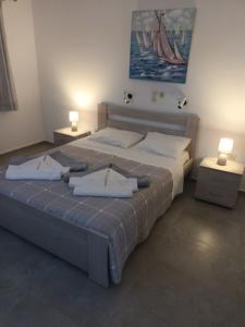 Postel nebo postele na pokoji v ubytování Holidays in Paros