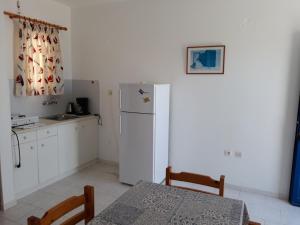Kuchyň nebo kuchyňský kout v ubytování Holidays in Paros