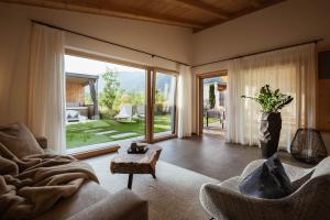 Posezení v ubytování Amolaris Garden Lodges & Guesthouse