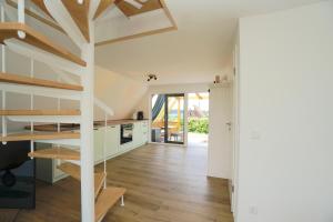 Kuchyň nebo kuchyňský kout v ubytování Ferienhaus Nurda - Seeblick am Wittensee + 21 fotografií