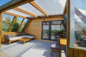 Posezení v ubytování Ferienhaus Nurda - Seeblick am Wittensee