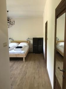 Posteľ alebo postele v izbe v ubytovaní Deviza Apartments