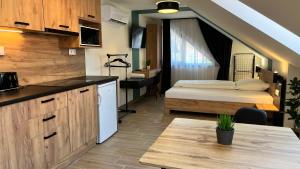 Kuchyň nebo kuchyňský kout v ubytování Rezidex Apartmanház