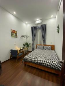 Giường trong phòng chung tại An Homestay