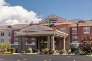 a hotel with a sign on the front of it at Holiday Inn Express Hotel & Suites Binghamton University-Vestal, an IHG Hotel in Vestal
