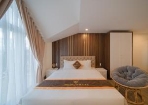 Postel nebo postele na pokoji v ubytování BẢO DUY HOTEL 5