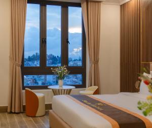 Postel nebo postele na pokoji v ubytování BẢO DUY HOTEL 5