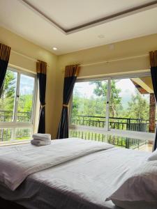 Un pat sau paturi într-o cameră la Marina Homestay