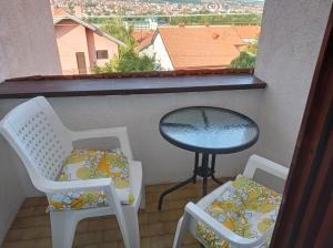 Balkón nebo terasa v ubytování APARTMAN U BUKOVICKOJ BANJI ARANDJELOVAC + 5 fotografií