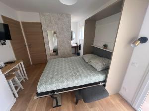Postel nebo postele na pokoji v ubytování Chambre privée avec SDB et WC