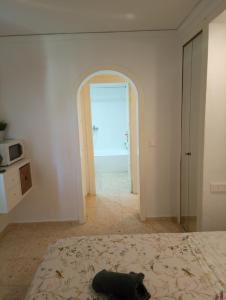 Postel nebo postele na pokoji v ubytování Alojamiento con Piscina y chiringuito Denia + 36 fotografií