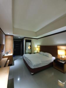 Postel nebo postele na pokoji v ubytování Nagoya Mansion Provide Netflix near Mall and CBD