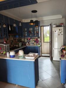 Virtuvė arba virtuvėlė apgyvendinimo įstaigoje Guest House Guriani
