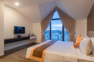 Postel nebo postele na pokoji v ubytování BẢO DUY HOTEL 5
