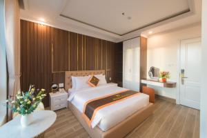 Postel nebo postele na pokoji v ubytování BẢO DUY HOTEL 5