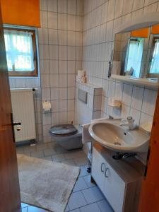 Kúpeľňa v ubytovaní Landhaus Müller