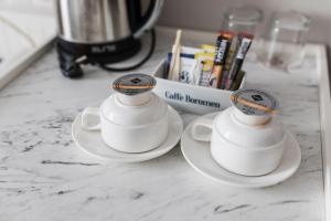 Příslušenství pro přípravu čaje a kávy v ubytování Hotel Anna Palace