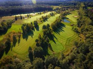 an overhead view of a golf course with a green at Golf Resort Lázně Bohdaneč in Lázně Bohdaneč