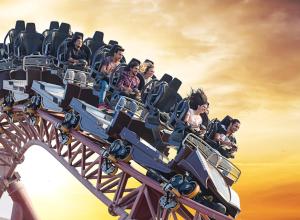 a group of people riding on a roller coaster at Lapita, Dubai Parks and Resorts, Autograph Collection in Dubai