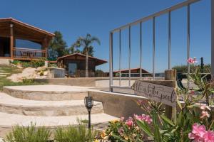 a skate park with a parking meter and flowers at Fernandes Guest House Green Bungalow in Ponte de Lima