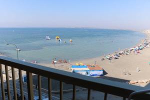 a view of a beach with people in the water at Sunset 4C in Santa Pola