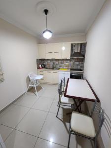 مطبخ أو مطبخ صغير في Esa Apart Hotel