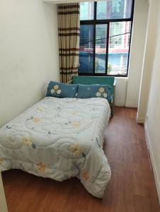 Postel nebo postele na pokoji v ubytování Hotel Ryan