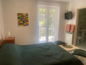 Postel nebo postele na pokoji v ubytování Villa Amari