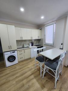 مطبخ أو مطبخ صغير في Esa Apart Hotel