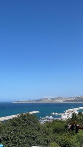a view of the ocean from the top of a hill at Tanger , Merchan in Tangier