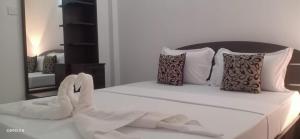 Letto o letti in una camera di Kavee Transit Hotel