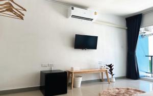 TV a/nebo společenská místnost v ubytování BAOBAB