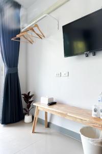TV a/nebo společenská místnost v ubytování BAOBAB