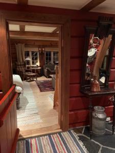 Χώρος καθιστικού στο Solsetra - Mountain Majesty Family Log Cabin