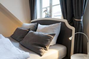 Postel nebo postele na pokoji v ubytování Rein Klassik Hotel