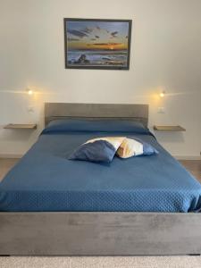 Postel nebo postele na pokoji v ubytování B&b Ciriapples