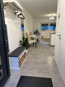 a room with a kitchen and a living room at Apartment am Deister in Barsinghausen