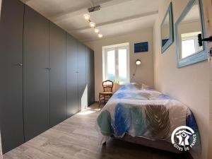 Letto o letti in una camera di MAS LO BOACH
