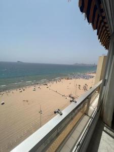 a view of a beach from a building at Benidorm Carolina Beach & Pool in Benidorm