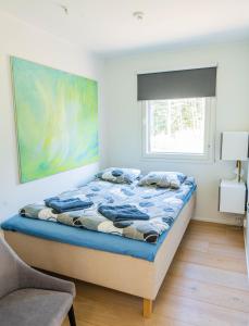 Postel nebo postele na pokoji v ubytování Villa Wikkelä