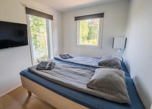 Postel nebo postele na pokoji v ubytování Villa Wikkelä