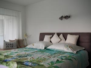 Posteľ alebo postele v izbe v ubytovaní Ferienwohnung Margarethe