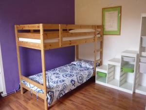 a bunk bed in a room with a bunk bedutenewayewayangering at Casa di Giò in Pettenasco
